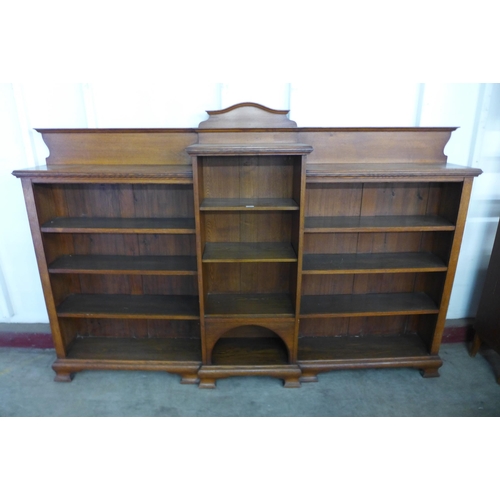 150 - A large Victorian oak open bookcase