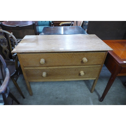 160 - A light oak chest of drawers