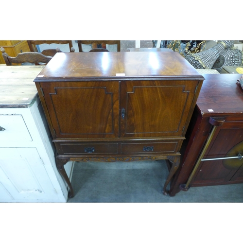 173 - A mahogany cocktail cabinet