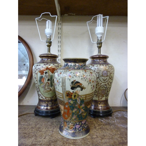 312 - A pair of oriental style satsuma table lamps and a vase