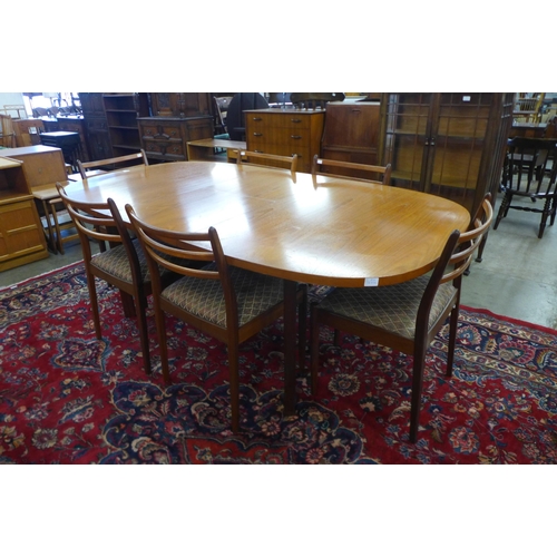 48 - A G-Plan teak extending dining table and six chairs