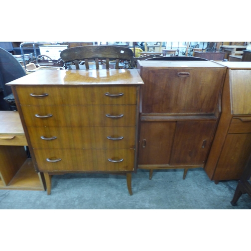 53 - A Wrighton teak chest of drawers and a teak bureau, a/f