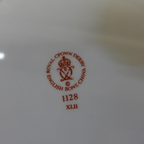 605 - A Royal Crown Derby 1128 pattern dinner plate, a side plate and an Abbeydale side plate, dinner plat... 