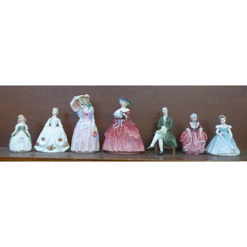 610 - Seven Royal Doulton figures including Miss Demure and Genevieve