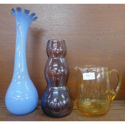 612 - A Whitefriars lemon glass jug, a 1960's amethyst glass vase and a pale blue tall glass vase