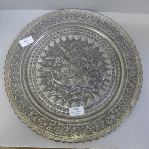 616 - A Persian Qalamani plate, Qajar Dynasty, 1794-1925, 38cm