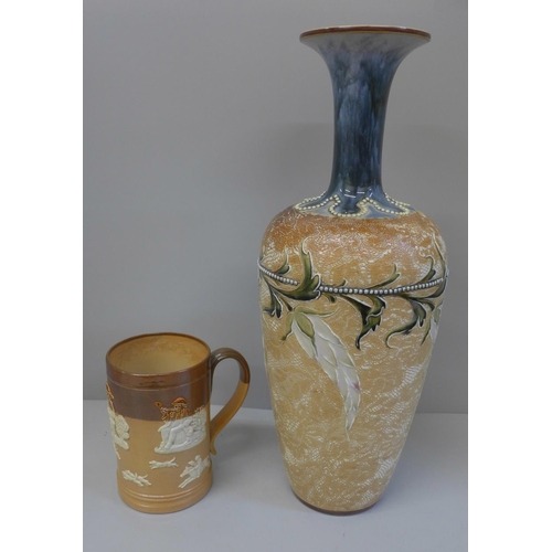 618 - A Doulton Lambeth stoneware vase, and a Royal Doulton stoneware mug