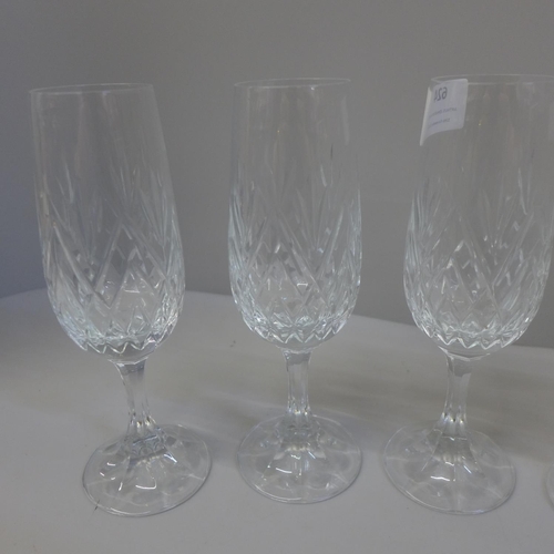 624 - Six cut glass champagne flutes