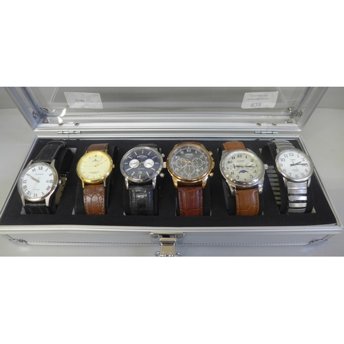 628 - An aluminium watch storage box with six wristwatches including Rotary Avenger chronograph