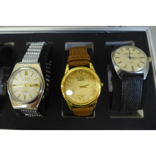 629 - An aluminium watch storage box with six wristwatches including Citizen automatic and Oris Super