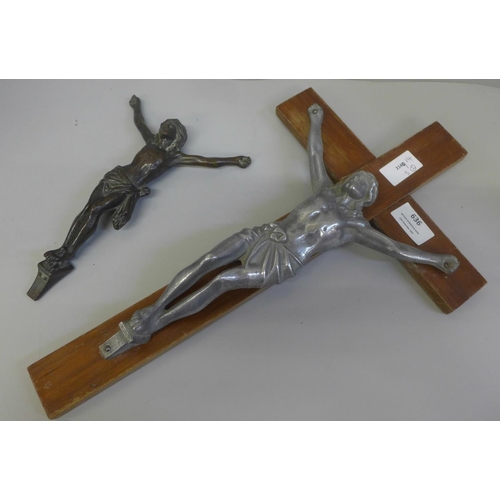 636 - A 19th Century bronze crucifix and an alloy crucifix