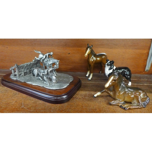 645 - Two Beswick foals, a Beswick sheepdog and a pewter model of steeplechasers