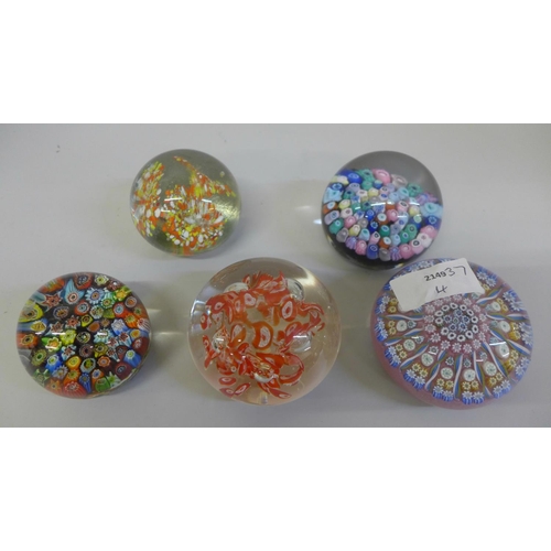 649 - Five glass paperweights including three Millefiori