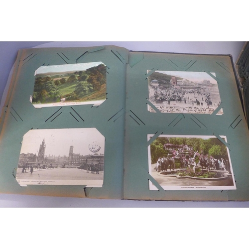 679 - Two albums of Edwardian and later postcards