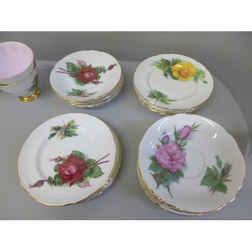 689 - Harry Wheatcroft World Famous Roses by Paragon, six cups, nine tea plates and eleven saucers, plus t... 