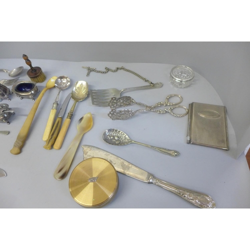 715 - A silver rimmed salt, flatware, compacts, etc.