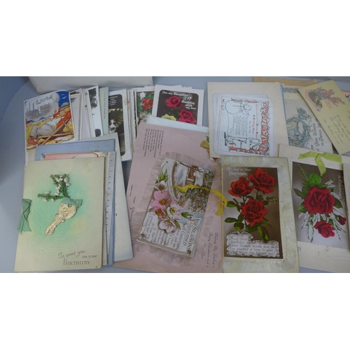 720 - A collection of early 20th Century cards and postcards