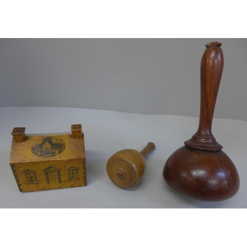 721A - Two wooden mallets and a treen money bank