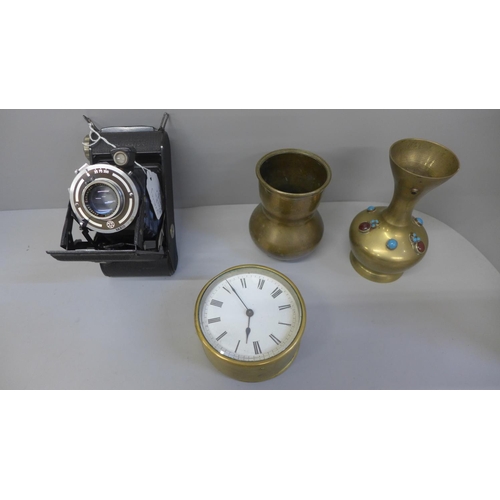 725 - A 19th Century French clock, a brass vase with cabochon stones set, one other brass vase and a Germa... 