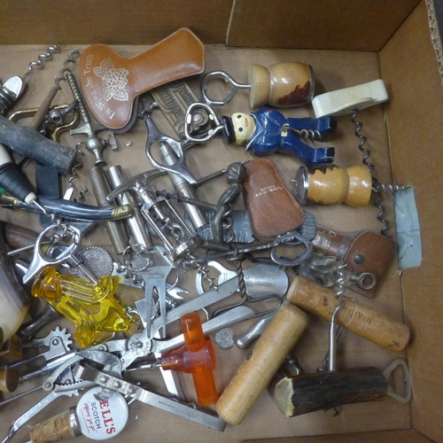 744 - Approximately fifty vintage bottle openers and corkscrews