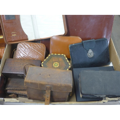 817 - Leather goods and other items, a shaving set, a cigarette box, a leather camera case, etc.