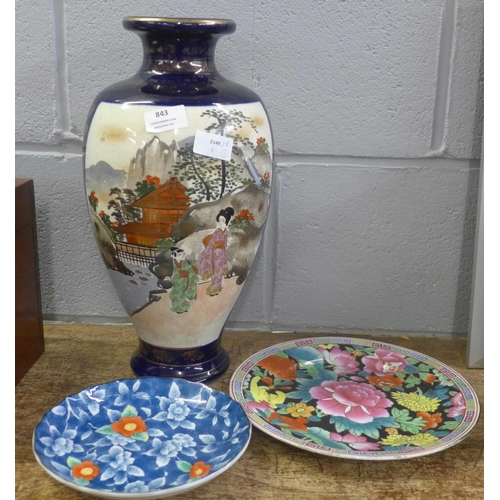 843 - An oriental vase, 39cm and two plates