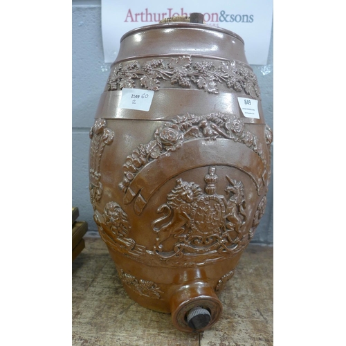 849 - A salt glaze flagon with crest, a/f, 36cm