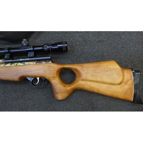 854 - A SMK TH78D 5.5mm air rifle with scope, CO2 cartridge