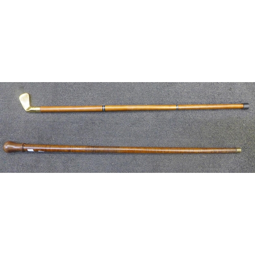 860 - Two walking sticks, one with golf head top