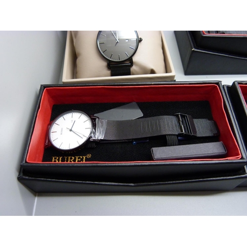 912 - Five Burei designer wristwatches, all boxed