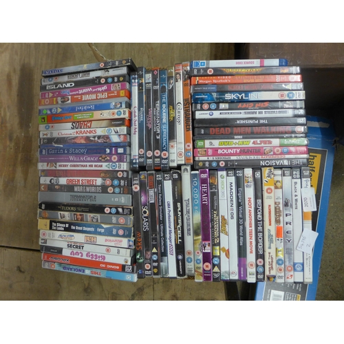 2076 - Box of approximately 60 DVDs and games