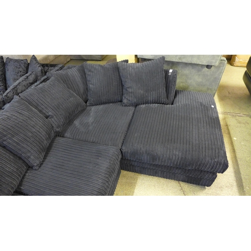 1585 - A black jumbo corduroy RHF corner sofa