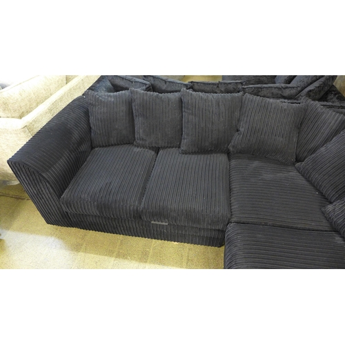 1585 - A black jumbo corduroy RHF corner sofa