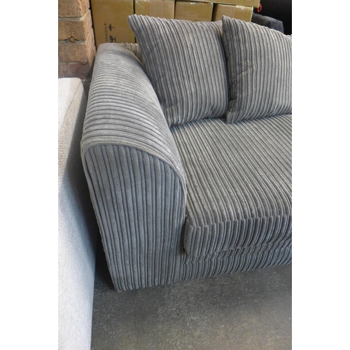 1592 - A pair of grey jumbo cord three seater sofas