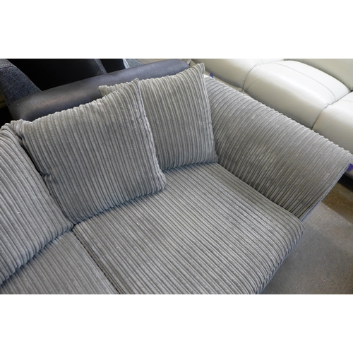 1592 - A pair of grey jumbo cord three seater sofas