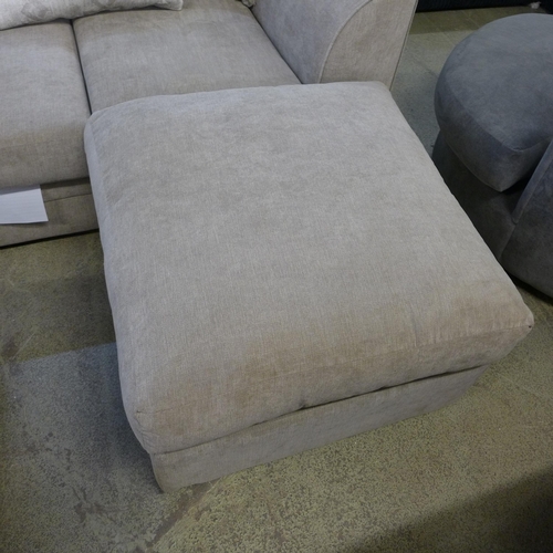 1595 - A sandstone upholstered patterned scatter back two seater sofa with footstool