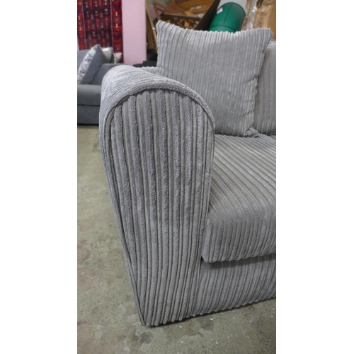 1580 - A grey jumbo cord corner sofa