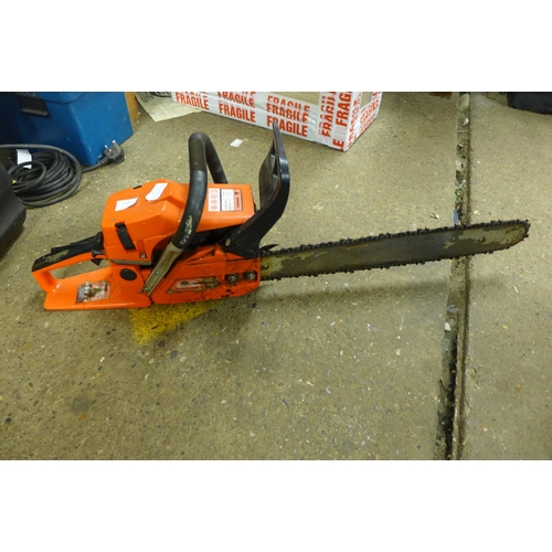 2105 - Timberpro chainsaw with spare chain and pair of Oregon Yukon US Boots