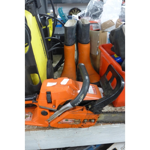 2105 - Timberpro chainsaw with spare chain and pair of Oregon Yukon US Boots