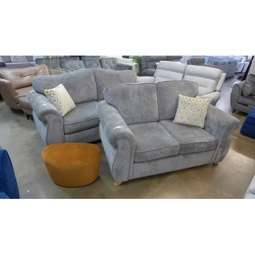 1301 - A grey velvet upholstered two and three seater sofa