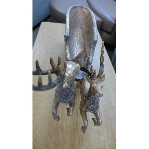 1313 - A reindeer and sleigh table ornament