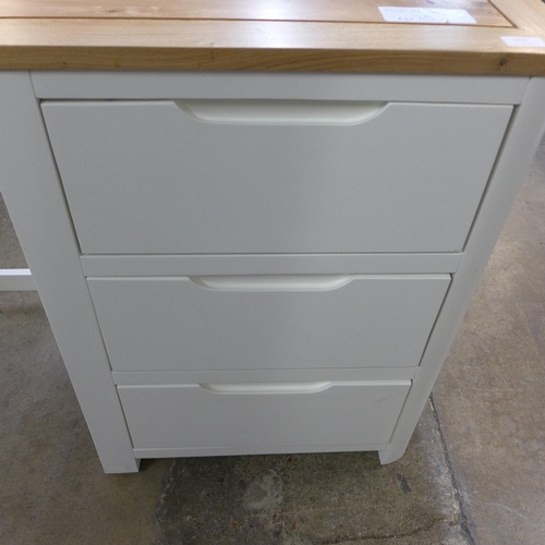 1472 - A Hove ivory painted and oak top three drawer desk/dressing table * this lot is subject to VAT