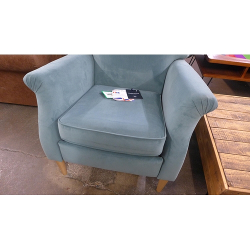 1475 - A Parker Knoll pastel green velvet upholstered electric reclining armchair