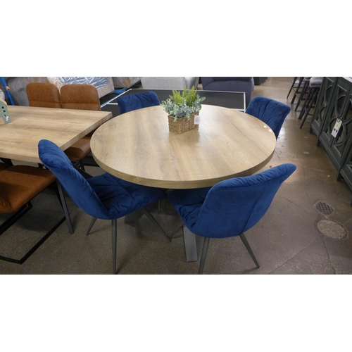 1477 - A Ridley round table and four Arana blue chairs