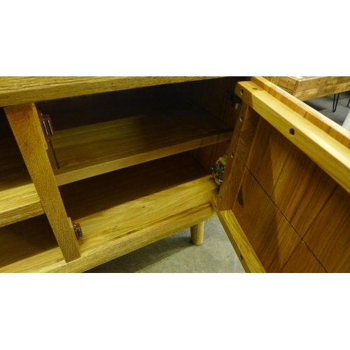 1486 - A rustic timber natural finish two door TV unit * this lot is subject to VAT