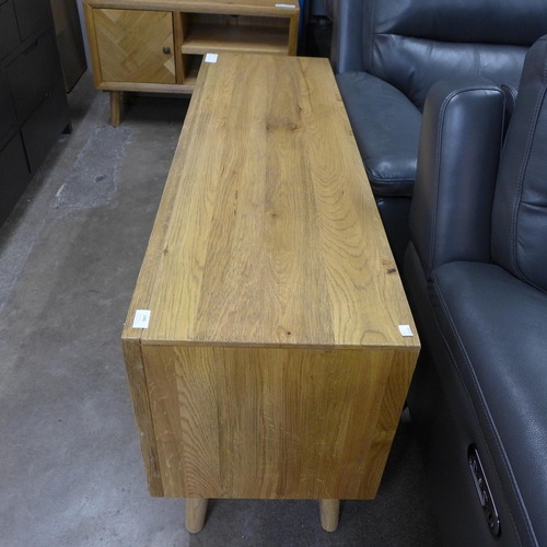 1486 - A rustic timber natural finish two door TV unit * this lot is subject to VAT