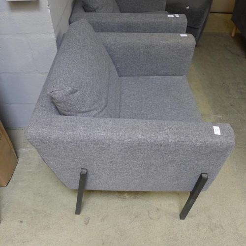 1506 - A grey upholstered armchair