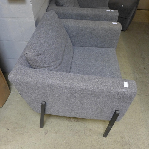 1507 - A grey upholstered armchair