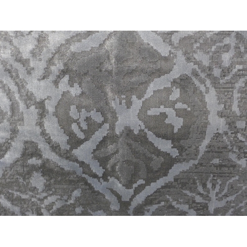 1516 - A charcoal ground contemporary carpet with an all over design