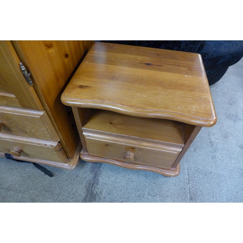 1526 - A pine two door wardrobe and bedside chest